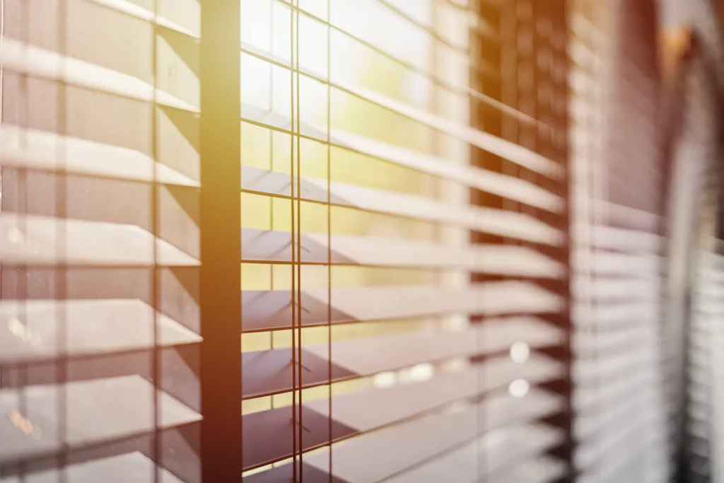 Blinds with sunshine through them