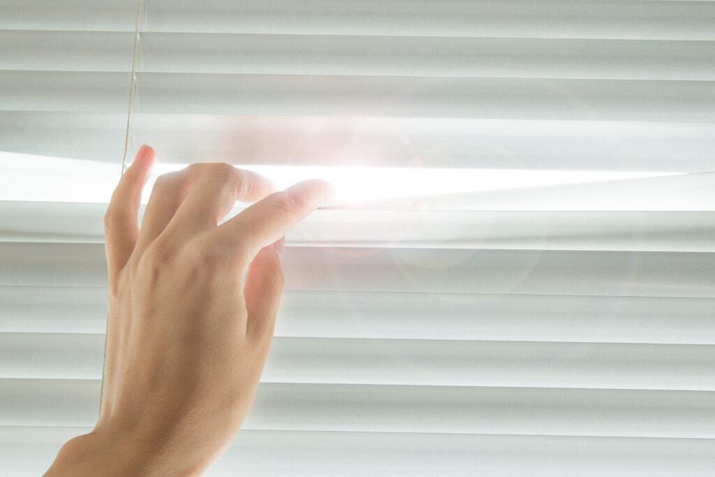 hand adjusting blinds